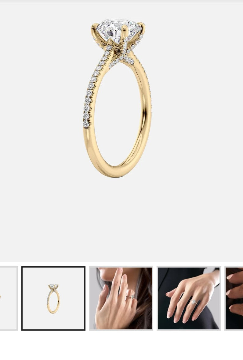 Custom 0.75ct Pear Ring with a pavé setting and a hidden halo
